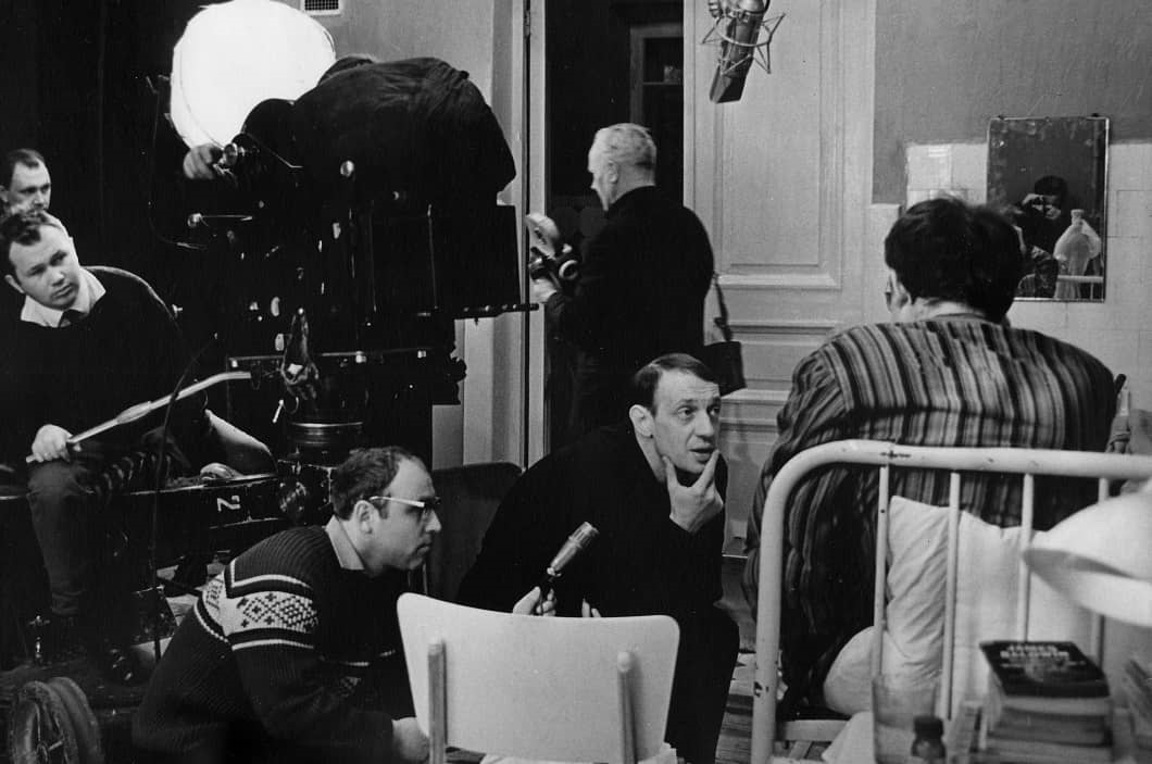 Actress records her final lines in a Leningrad dubbing studio as the crew listens—evoking the body–voice split in Averbakh’s The Voice (1982).