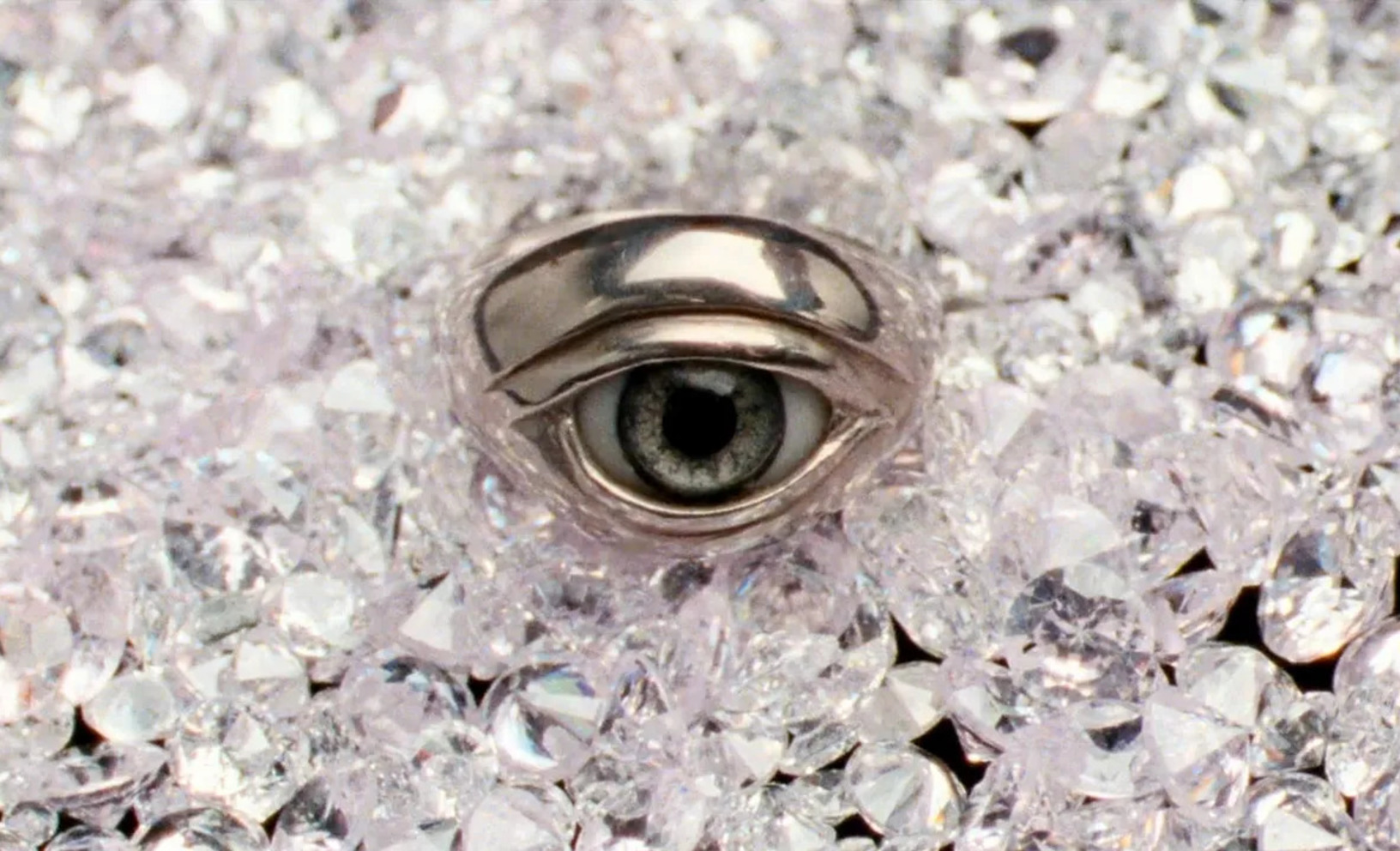 Sun-scorched ruin above the Mediterranean; leather, steel, gold, and blood framed in fetishistic close-ups—*Let the Corpses Tan* (2017).